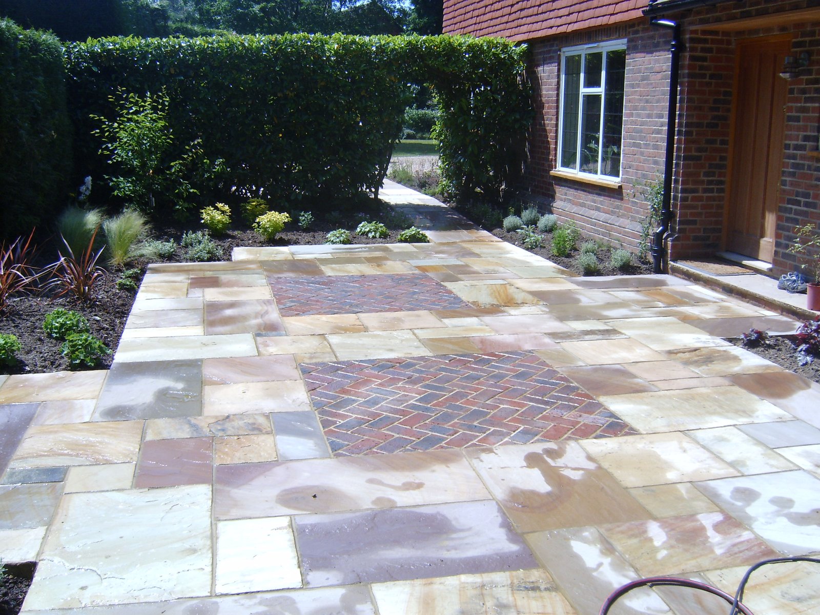 Indian sandstone paving and brickwork garden project